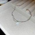 Dettaglio del bracciale a doppio strato in argento con croce e zirconi cubici - Bracciale a Doppio Strato con Croce / Bracciale - Argento