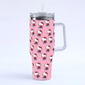 Close-up of pink 40oz tumbler with cartoon cat patterns and ergonomic white handle - R163 / 40oz