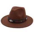 Macro detail of the dark brown wool felt fedora with a vintage silver engraved buckle belt - Coffee