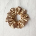 Elastic satin scrunchie for women in elegant champagne gold with silky texture finish - Khaki