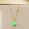Detailed macro view of a green enamel apple pendant on a golden stainless steel chain - Green Apple Style (KN292101-Z)