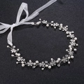 Silver bridal hair piece with white pearls, rhinestones and organza ribbons on black background - Silver Artificial Pearl Rhinestone Ribbon Hair Band (HS-J4519)