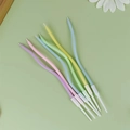 Set of 6 colorful pastel spiral candles with wave shapes for creative birthday cake decor - Colorful Curved Candle