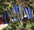 Close-up of lapis lazuli crystal crown with bronze butterfly and bird skull ornaments - Butterfly Raven Skull Style / Lapis Lazuli/Antique Bronze Wire