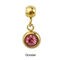 Detailed view of October birthstone charm with pink gemstone and gold finish for jewelry - Gold - October