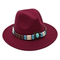 Close-up of bohemian style turquoise beads and ethnic woven band on burgundy wool fedora hat - One Size / Burgundy