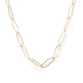 Macro shot of gold-plated elongated hexagonal chain links with high-polish metallic shine - Exaggerated Chunky / Gold