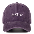 Close-up of white ESKETIT embroidery on a washed purple vintage cotton baseball cap - Purple