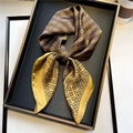 Elegant mustard yellow and brown silk square scarf featuring classic chain link patterns - Khaki