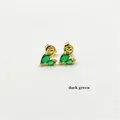 Detailed close-up of gold-plated heart earrings featuring dark green teardrop zircon stones - Dark Green Teardrop Zirconia (ZYN-DKE244G-B) / Dark Green