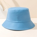 Classic bright sky blue cotton bucket hat with reinforced stitching on a soft beige background - Denim Blue