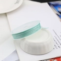 Mint green braided nylon cord on a clear spool for DIY jewelry and craft making - 10m / Mint Green