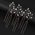 Detailed macro view of 6 gold bridal hair pins with white pearls and marquise stones - Opal White