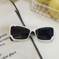 Retro cream white cat-eye sunglasses with dark lenses on a textured fabric backdrop - Rice White 19 - Rectangular Full Frame Minimalist