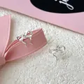 Élégantes boucles d'oreilles nœuds papillon en argent fin S999 au fini poli - Boucles d'Oreilles Clous Noeud / Argenté