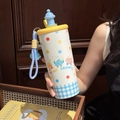 Cute cream-colored monster straw thermos with blue checkered base and yellow lid - 700ml / Yellow