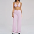 Women's two-piece light pink yoga set with twist crop top and high waist wide leg pants - S / Sakura Pink