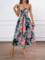 Dettaglio dell'elegante scollo all'americana con vivace stampa floreale su un abito lungo - S / Stampa Rosso Nero