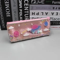 Pink glitter pencil case with star travel theme and decorative fluffy pom poms - Pencil Case Pink