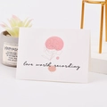 Minimalist white greeting card with line flower art and 'love worth recording' text - Love worth recording