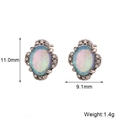Detail view of oval opal stud earrings with crystal halo and 11.0mm x 9.1mm dimensions - Retro Oval Petal Opal Earrings (Silver Blue)