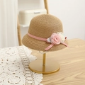 Close-up of girls straw hat featuring pink ribbon and delicate fabric flower detail - Straw Hat / Khaki