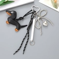 Stylish black leather dachshund dog keychain with woven rope and silver heart charm - Dachshund Pendant Black (K4676)