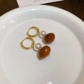 Detail of 14K gold plated earrings featuring a white pearl and brown tiger eye bead - Pearl Amber Hoop (12#) / Dark Brown