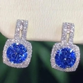 Deep blue round cubic zirconia halo stud earrings with micro-pave silver plating - Blue
