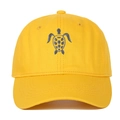 Close-up of grey turtle embroidery on a vibrant yellow cotton baseball cap detail - Yellow