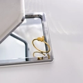 Close-up of golden bunny ring on mirror surface showing polished titanium steel detail - Rabbit