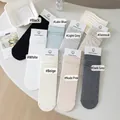 Confezione da 8 paia di calze estive in cotone a coste in vari colori Morandi - Taglia unica / Bianco