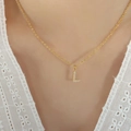 Titanium steel gold necklace featuring a letter L pendant with sparkling crystals - Letter L / Gold