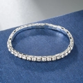 Close-up of a single row silver tennis bracelet featuring brilliant round-cut crystals - 1 Row / Silver