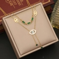 Detail of gold double-layer necklace with emerald stones and evil eye pendant on jewelry box - 3# Evil Eye Style