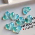 Macro shot of blue gradient translucent heart-shaped glitter resin DIY accessories - Single Piece (2cm) / Blue Heart