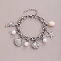 Bracciale marino in acciaio argento con ciondoli a cavalluccio marino, conchiglie e perle - Pendenti Cavalluccio Marino Conchiglia Stella Marina Pesce Perla / Argento