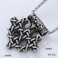 Detail of silver Viking Mjolnir pendant showing 38mm dimensions and complex metal textures - Viking Thor's Hammer Pendant