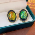 Boucles d'oreilles ovales vintage avec cadres dorés et émail noir iridescent - Clous Ovales Or Fond Noir Paillettes Multicolores