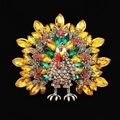 Turkey shaped brooch with colorful rhinestones and gold-tone finish on black background - Rhinestone Turkey / Gold