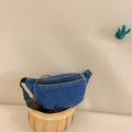 Blue denim crossbody waist bag for kids with black adjustable strap in a woven basket - Blue