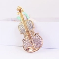 Squisito portachiavi a violino dorato con cristalli scintillanti e dettagli fini - Bianco