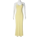 Detail of light yellow slim fit maxi dress featuring thin straps and elegant V-neckline - S / Yellow