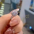 Classic silver-tone halo ring with a large round cubic zirconia and pavé band - TJZ196-Classic Halo Pave
