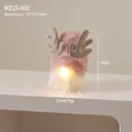 Pink plush Christmas reindeer gnome with golden antlers and warm LED lighting decoration - Pink Reindeer Antlers Gnome with LED