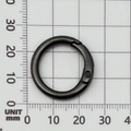 Black metal O-ring spring buckle with 28mm outer diameter on a measurement grid - 25mm Round Spring Ring / Gunmetal