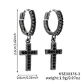 Detail of black cross earrings with zircon pavé, measuring 2.6cm by 0.8cm and 1.9g - Black