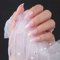 Macro detail of glossy translucent pink stiletto press-on nails with elegant pearl mesh - Translucent Pink (JJL-08)