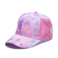 Detail of pink and blue tie-dye baseball cap with visible fabric texture and stitching - Adjustable / Pink