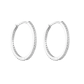 Detailed view of silver hoop earrings with pavé set cubic zirconia and click-top closure - Silver